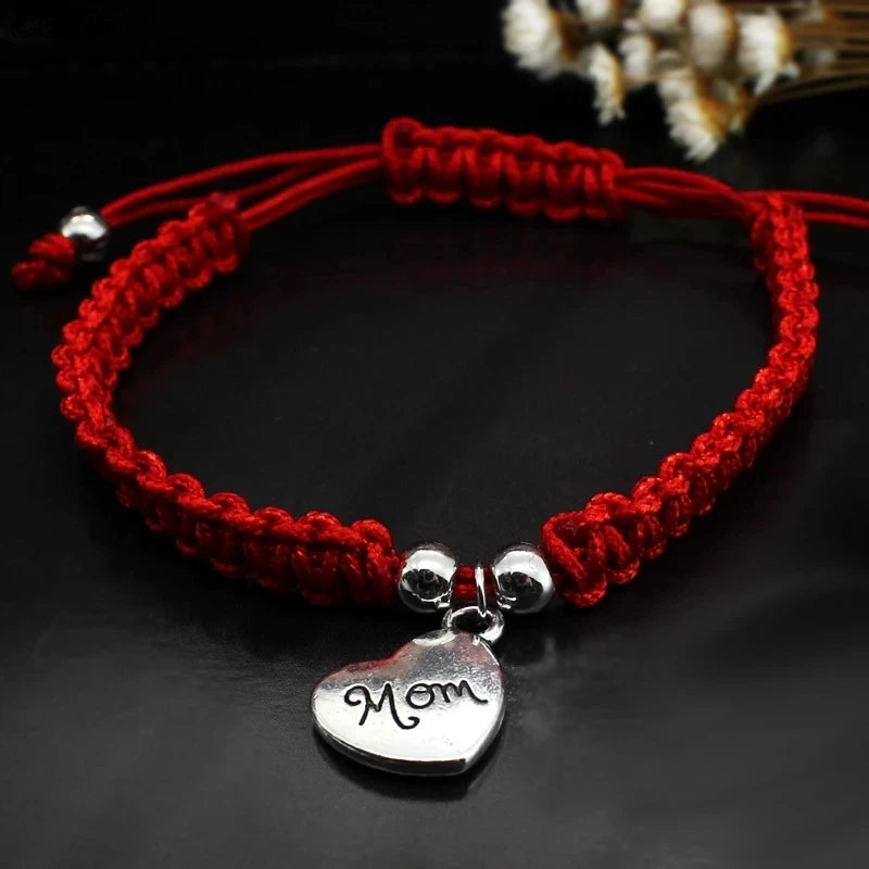 “Mom, I Love You” Red Heart Charm Bracelet: This elegant piece combines the warmth of a red thread bracelet with a delicate heart charm. It’s a lucky and meaningful gift for Mother’s Day.